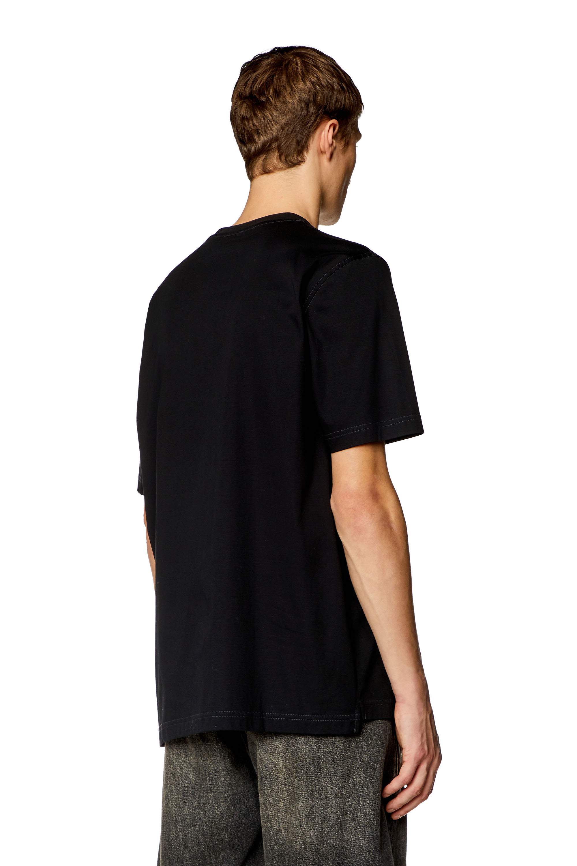 Diesel - T-MUST-SLITS-N2, Homme T-shirt avec imprimé Diesel Studio in Noir - Image 4
