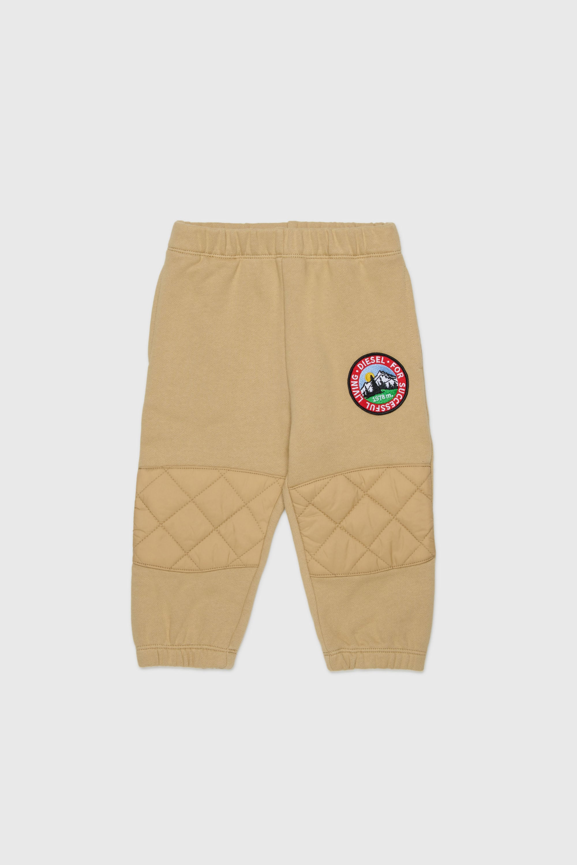 Diesel - PMONTB, Pantalon de surv&ecirc;tement avec empi&egrave;cements matelass&eacute;s aux genoux Mixte in Marron - 1