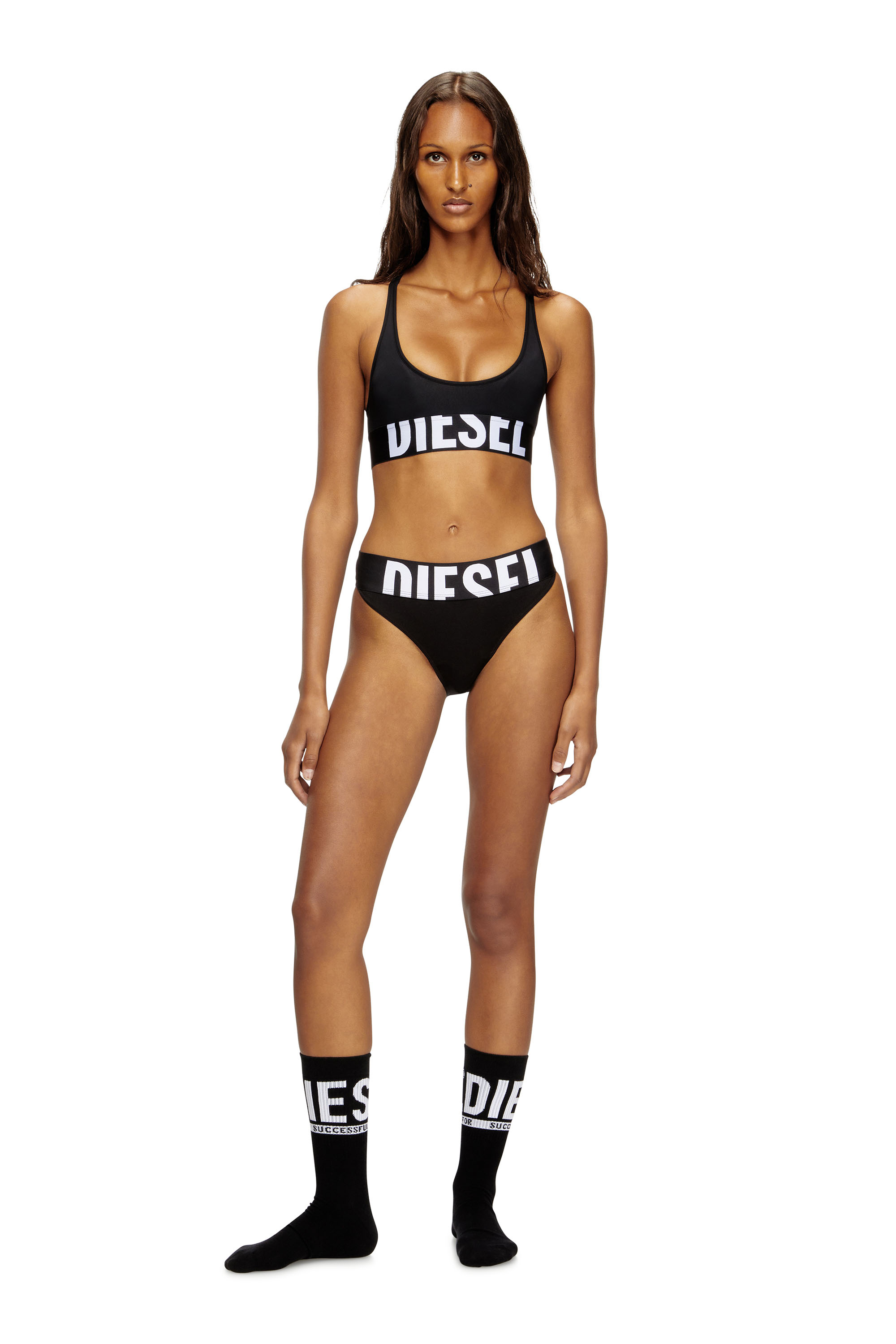 Diesel - ALLISON-D-POP, Brassière de sport en microfibre avec logo tronqué Femme in Noir - 1